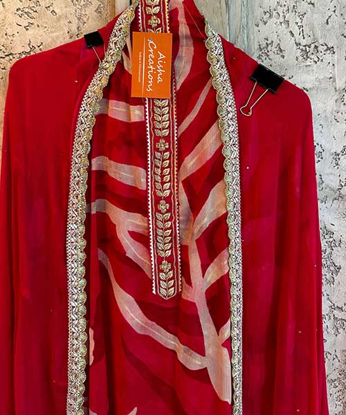 Pure Chinon Digital print With Handwork highlights on the front neck area.