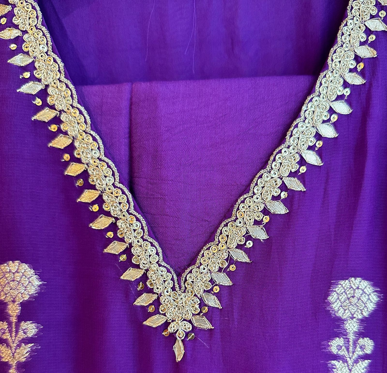 Pure soft organza designer zari weaved pattern plus embroidery on neckline