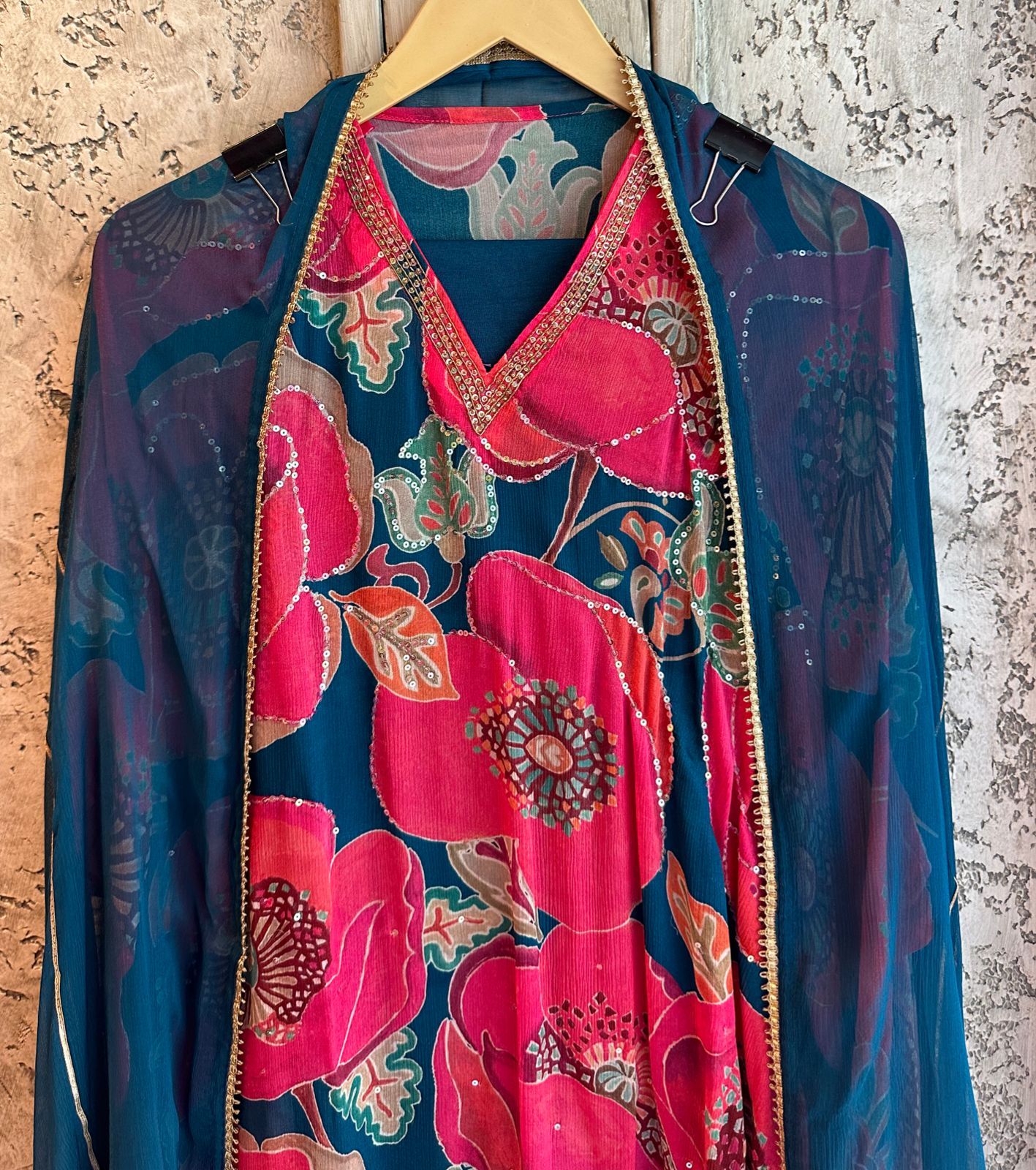 Pure Chinon Digital prints (Unstitched full size suits) With sequence highlights on the front neck area.