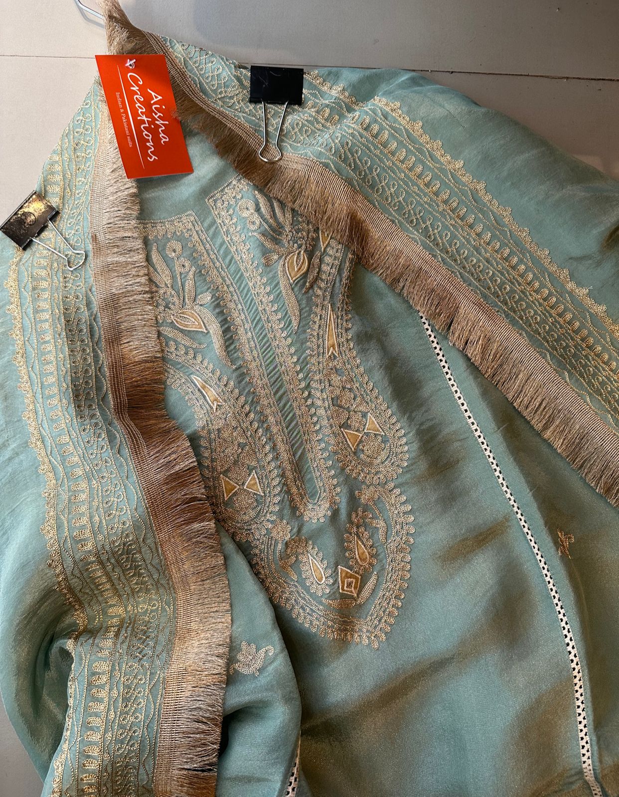 Pure tissue jacquard unstitched shirt with super beautiful gold zari work done the neckline