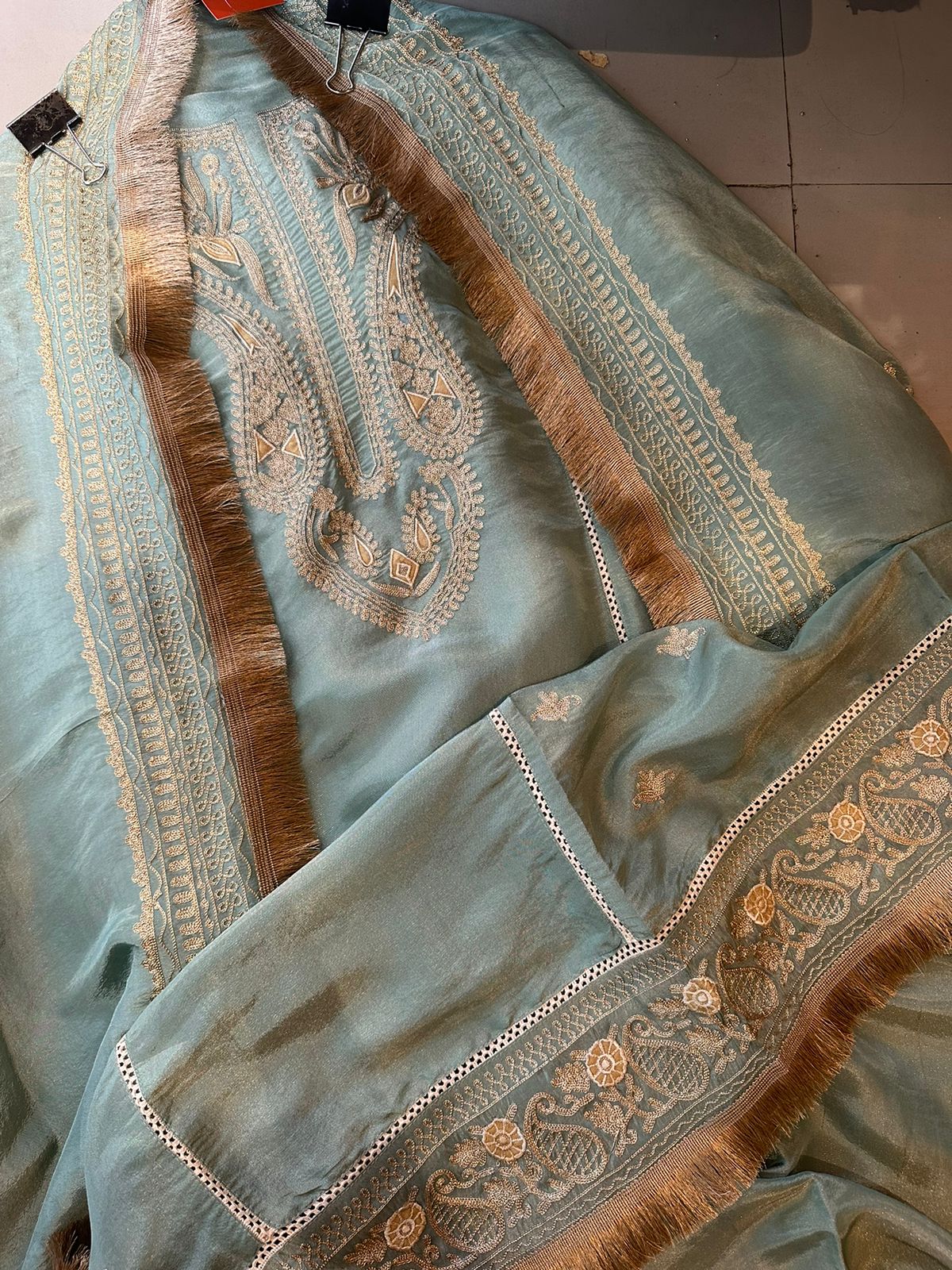 Pure tissue jacquard unstitched shirt with super beautiful gold zari work done the neckline