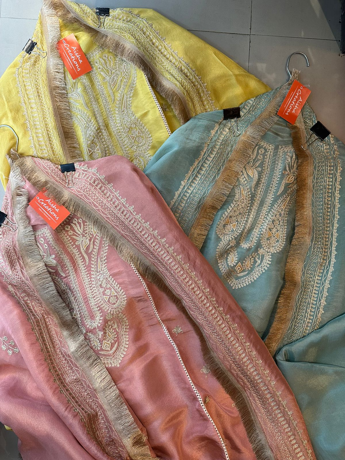 Pure tissue jacquard unstitched shirt with super beautiful gold zari work done the neckline And on the sides of the shirt