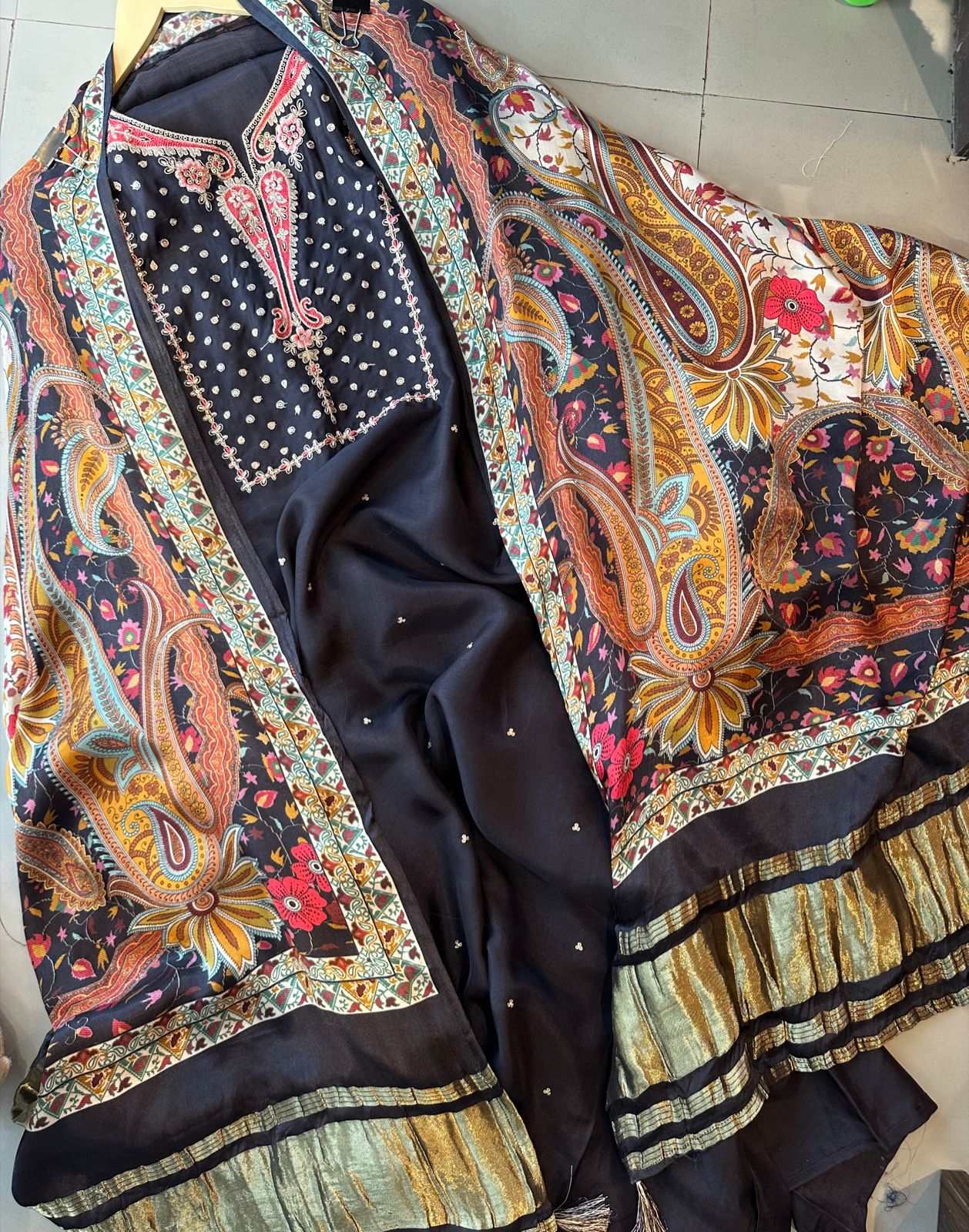 Pure silk shirt with very prettt Neckwork Rest the shirt is plain