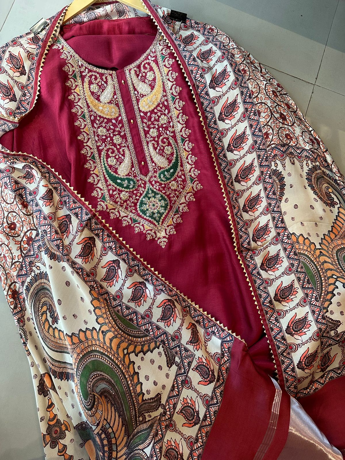 Pure dola silk unstitched shirt with beautiful embroidery on neck