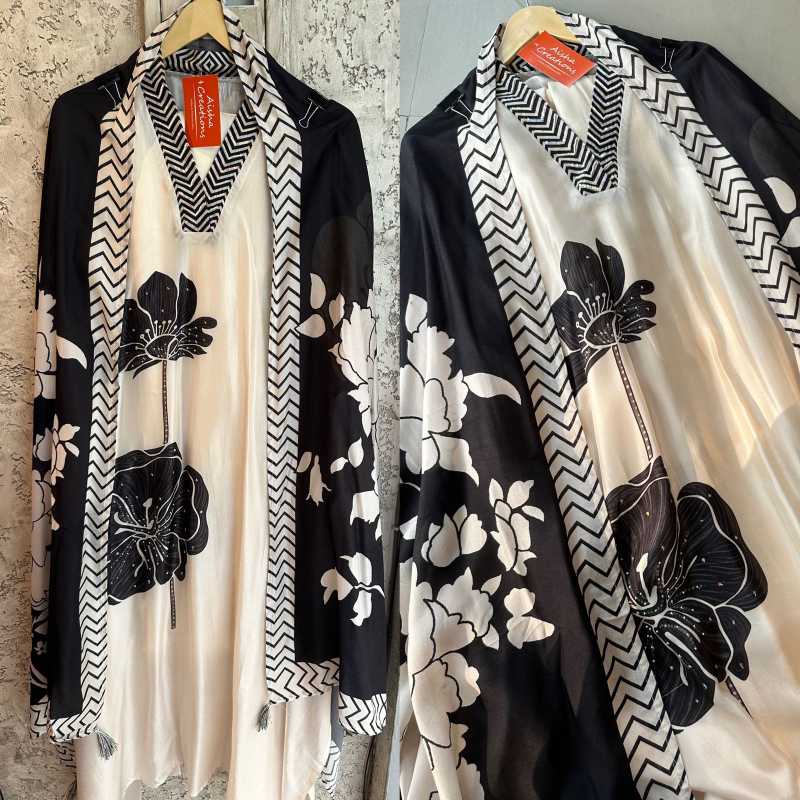 Pure silk shirt unstitched and full size shirt with very Beautiful handwork highlights on the neckline