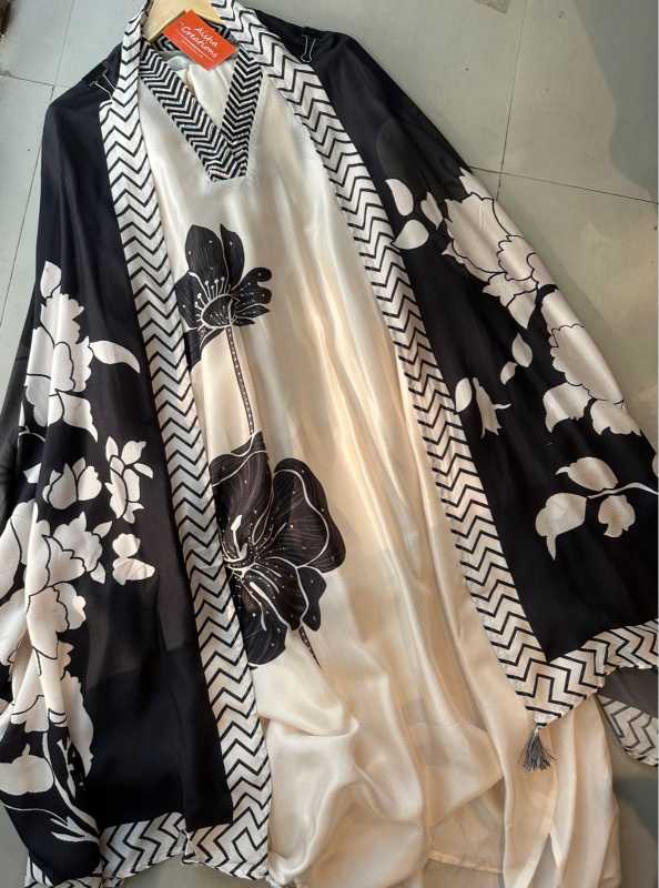 Pure silk shirt unstitched and full size shirt with very Beautiful handwork highlights on the neckline