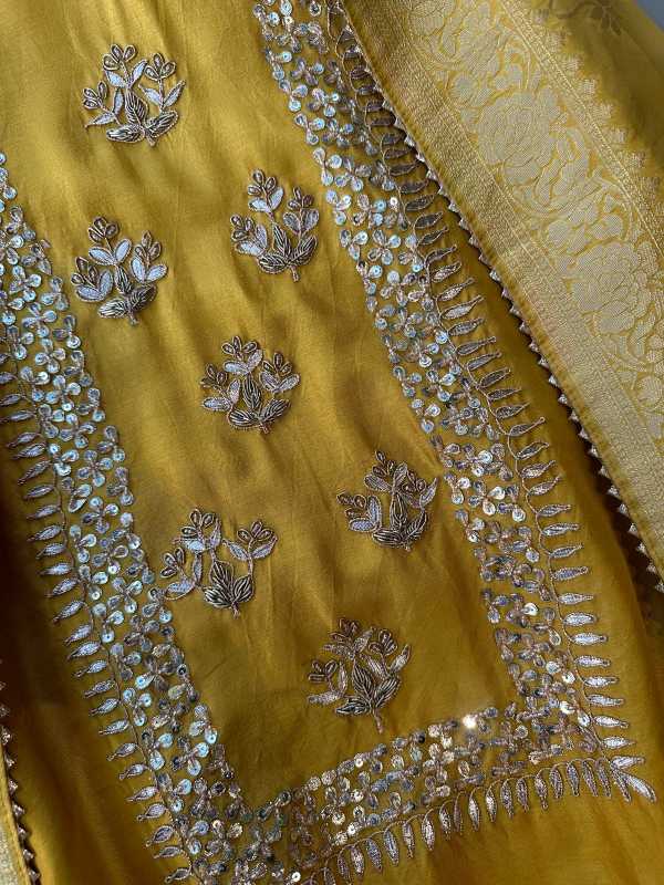 Pure mulberry silk shirt with very beautiful sequence dabka and gotta work on the neckline