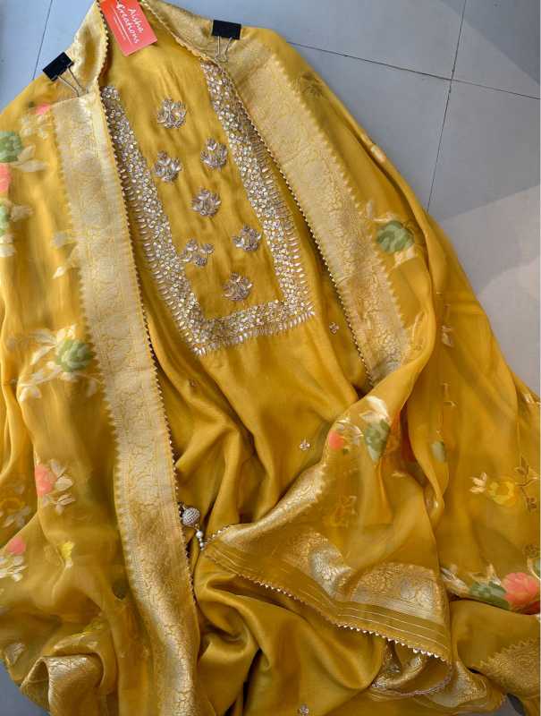 Pure mulberry silk shirt with very beautiful sequence dabka and gotta work on the neckline