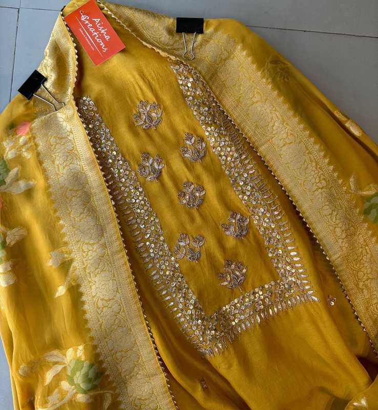 Pure mulberry silk shirt with very beautiful sequence dabka and gotta work on the neckline