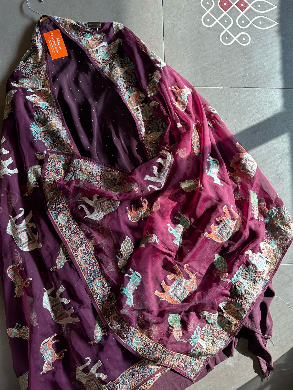 Pure Crepe silk shirt with complete swaroski highlights and a beautiful thread embroidered border