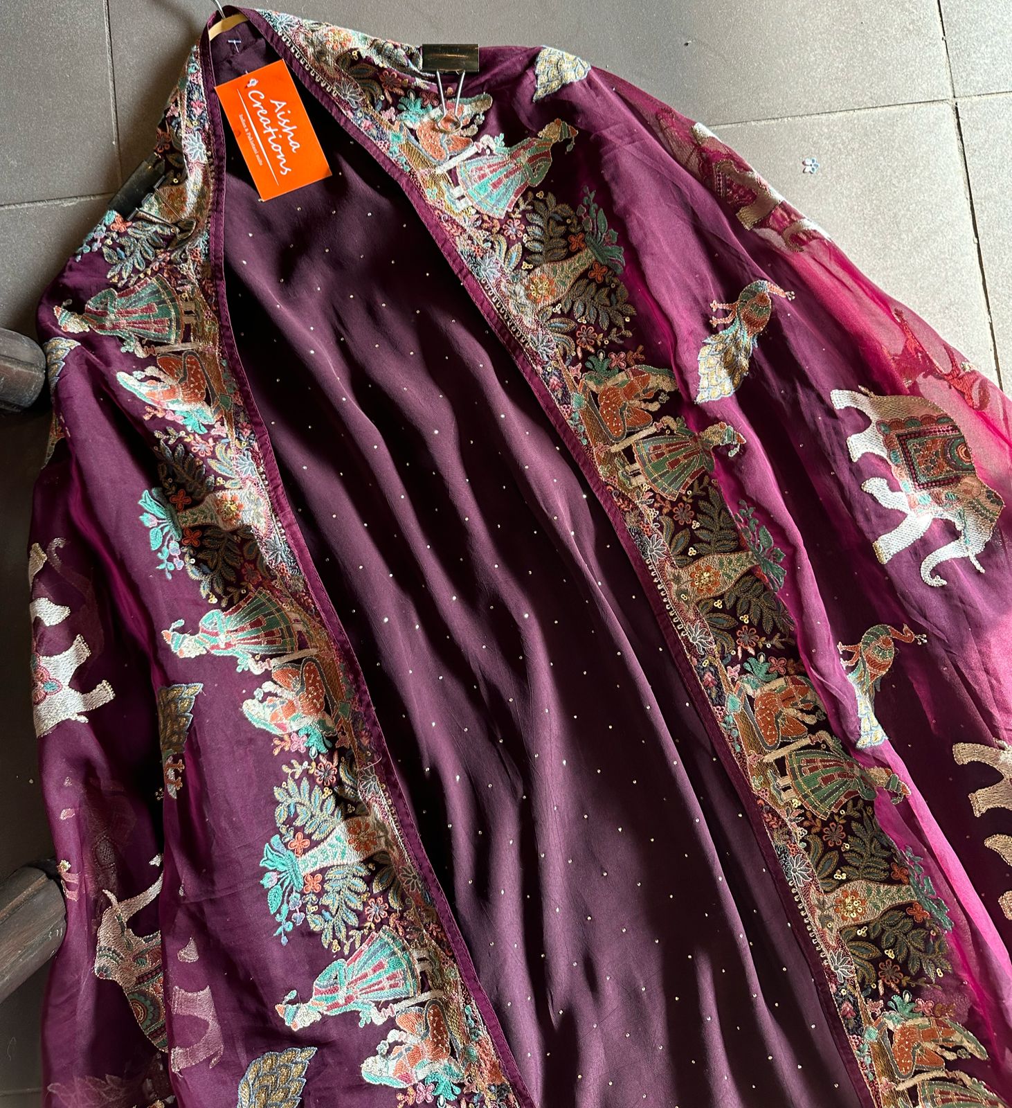 Pure Crepe silk shirt with complete swaroski highlights and a beautiful thread embroidered border