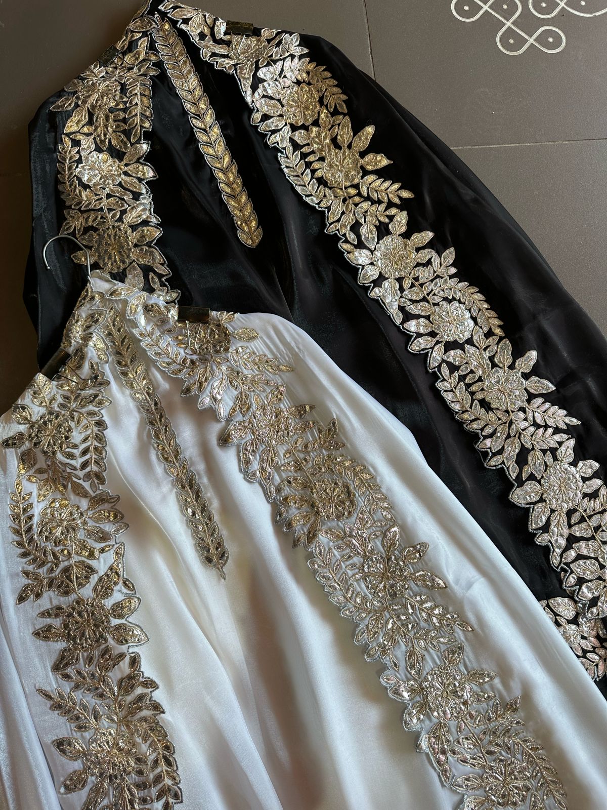 Plain shirt with neck Patti design and Cutwork done on the ghera of the shirt