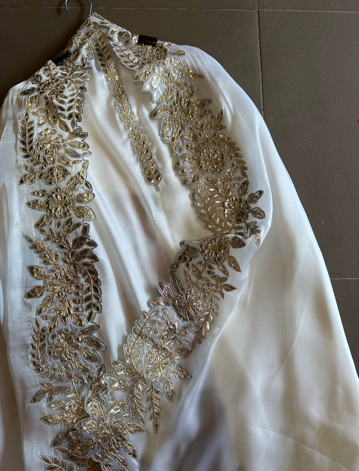 Plain shirt with neck Patti design and Cutwork done on the ghera of the shirt