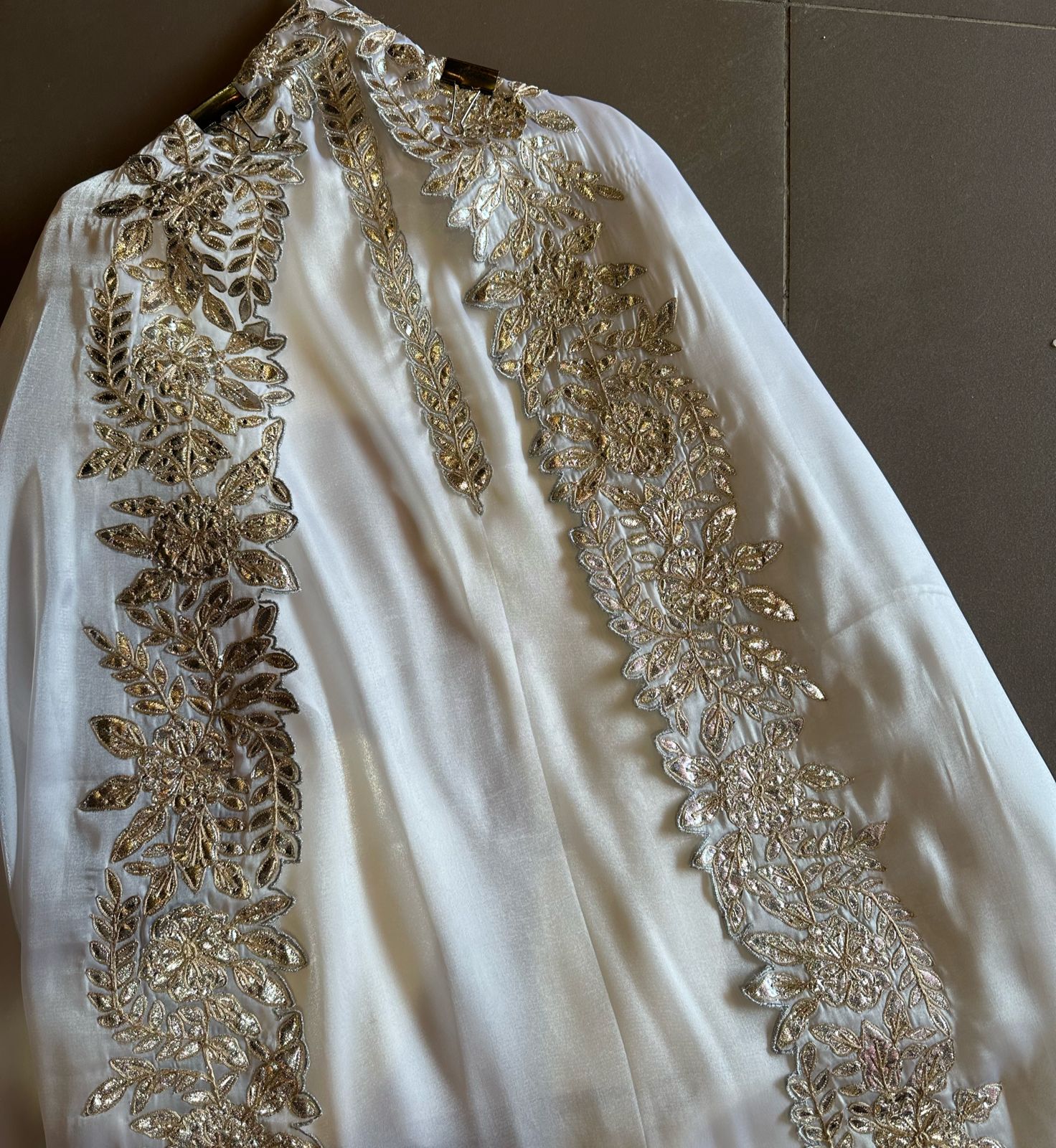 Plain shirt with neck Patti design and Cutwork done on the ghera of the shirt