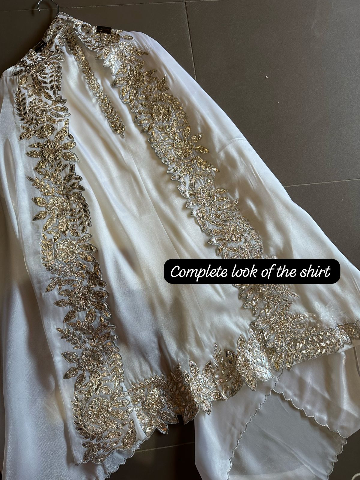 Plain shirt with neck Patti design and Cutwork done on the ghera of the shirt