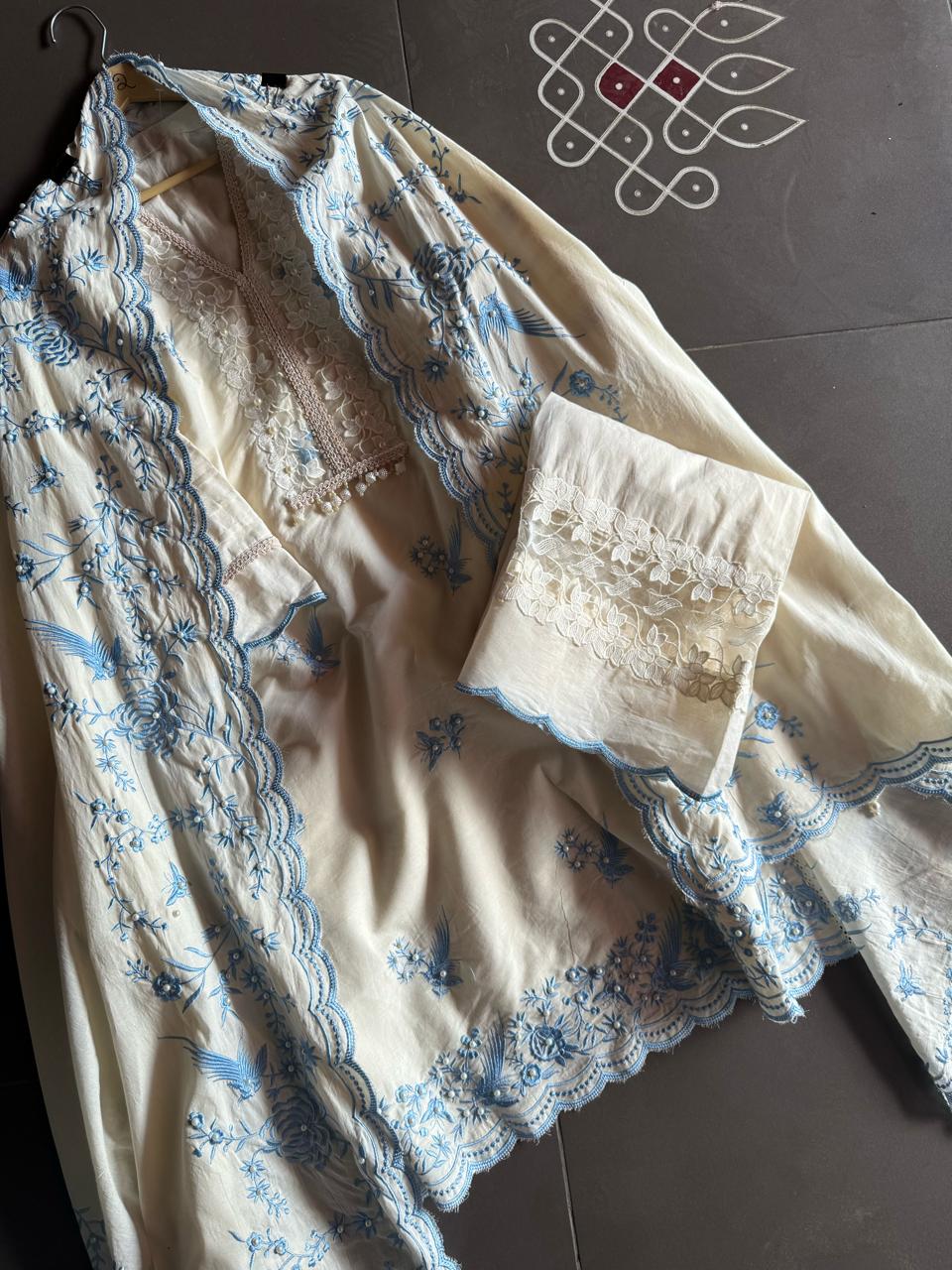 Pure cotton stitched shirt with a combination of hand and machine embroidery