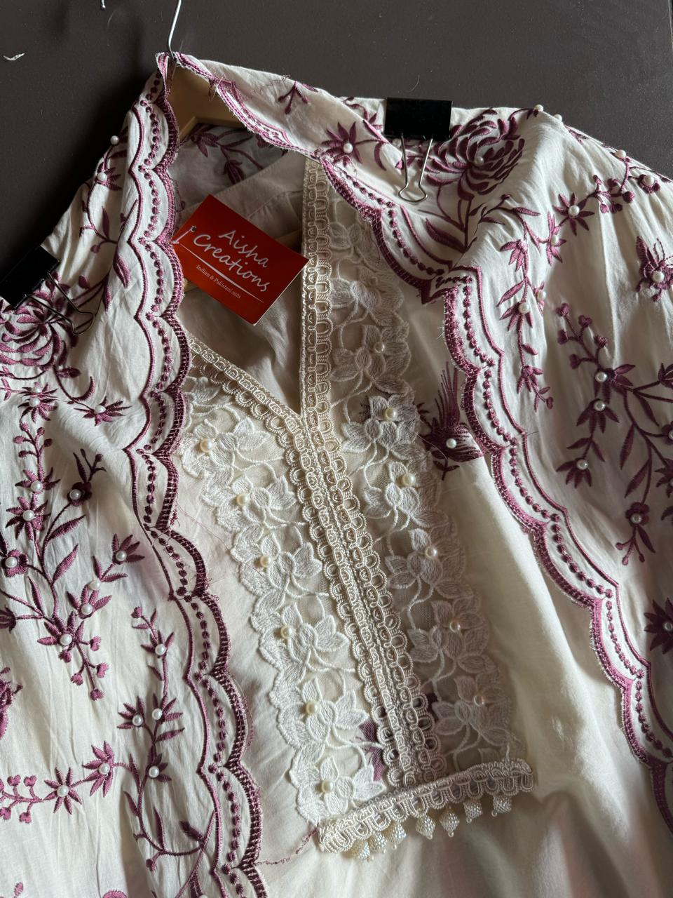 Pure cotton stitched shirt with a combination of hand and machine embroidery