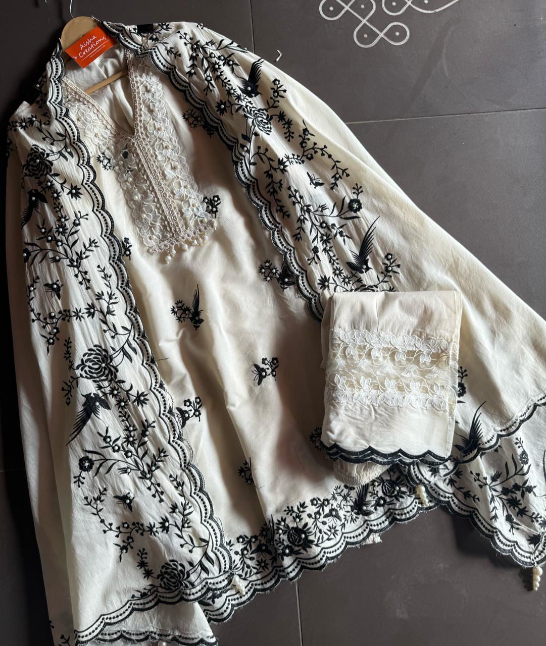 Pure cotton stitched shirt with a combination of hand and machine embroidery