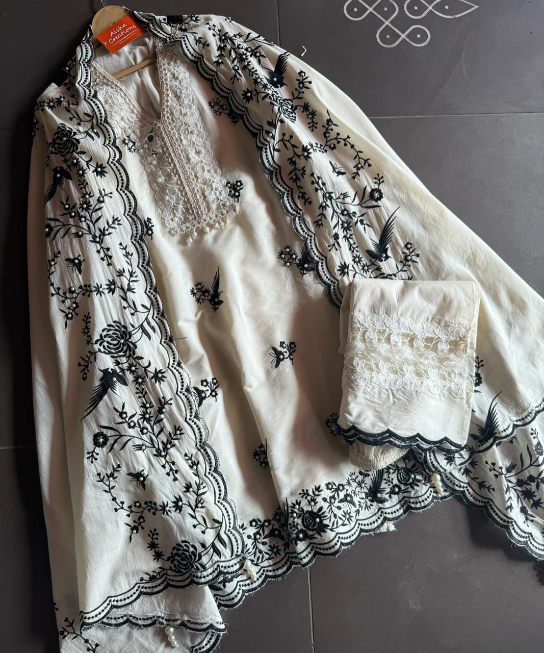 Pure cotton stitched shirt with a combination of hand and machine embroidery