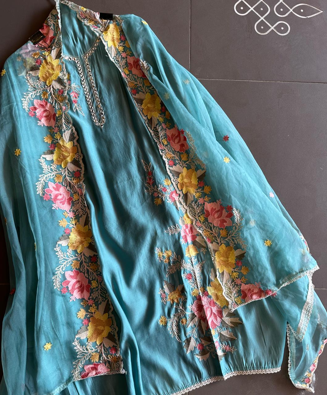 Soft cotton muslin shirt with mirror work  embroidery done on the neckline