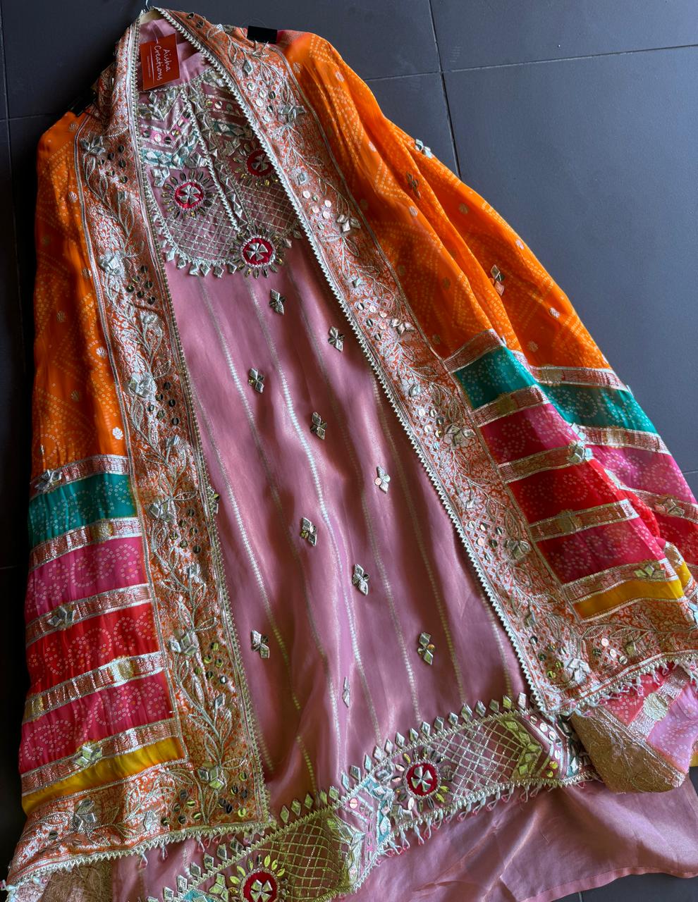 Soft and shimmery organza shirt with banarai weaving and original gotta work on the neckline and ghera also