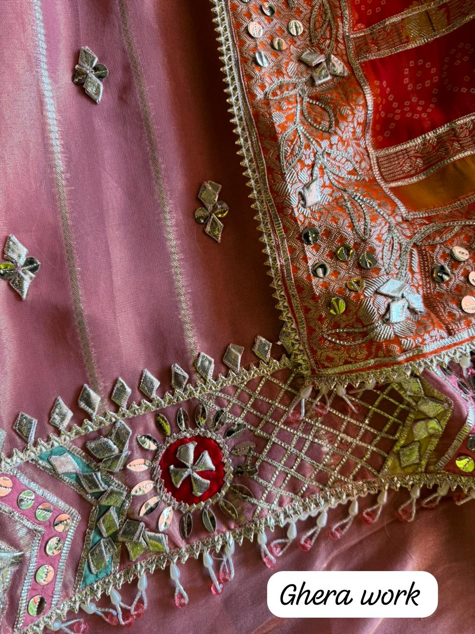 Soft and shimmery organza shirt with banarai weaving and original gotta work on the neckline and ghera also