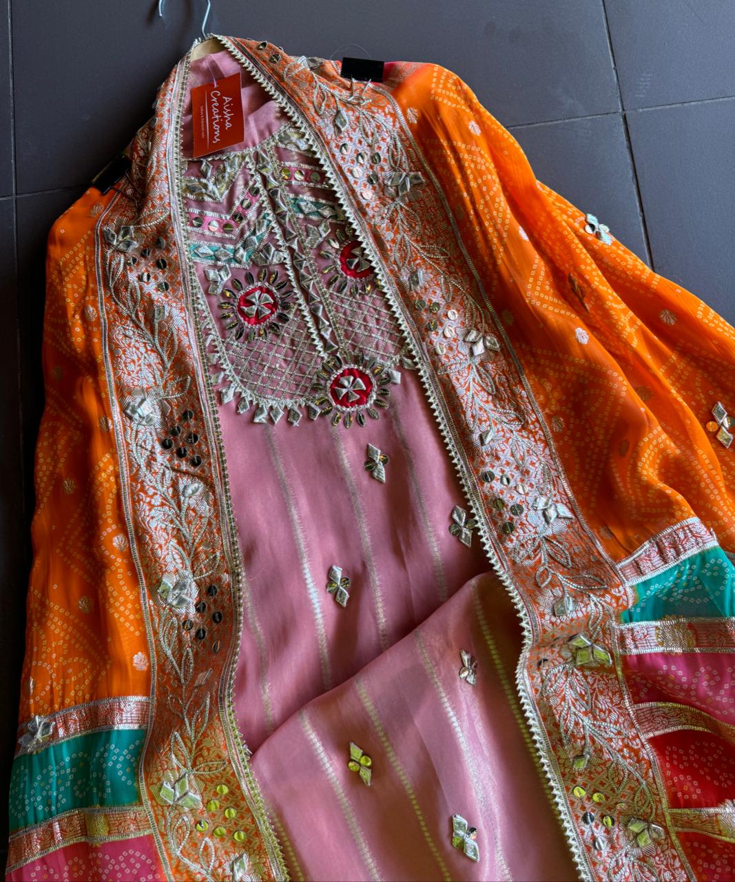 Soft and shimmery organza shirt with banarai weaving and original gotta work on the neckline and ghera also