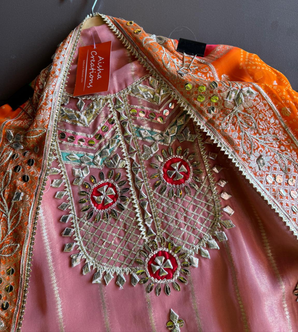 Soft and shimmery organza shirt with banarai weaving and original gotta work on the neckline and ghera also