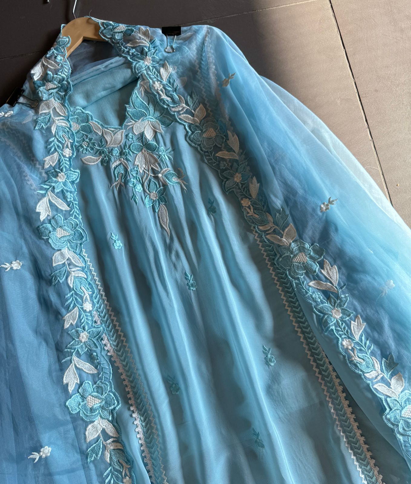 Soft organza shirt semi stitched with beautiful floral thread embroidery concept on the necklin