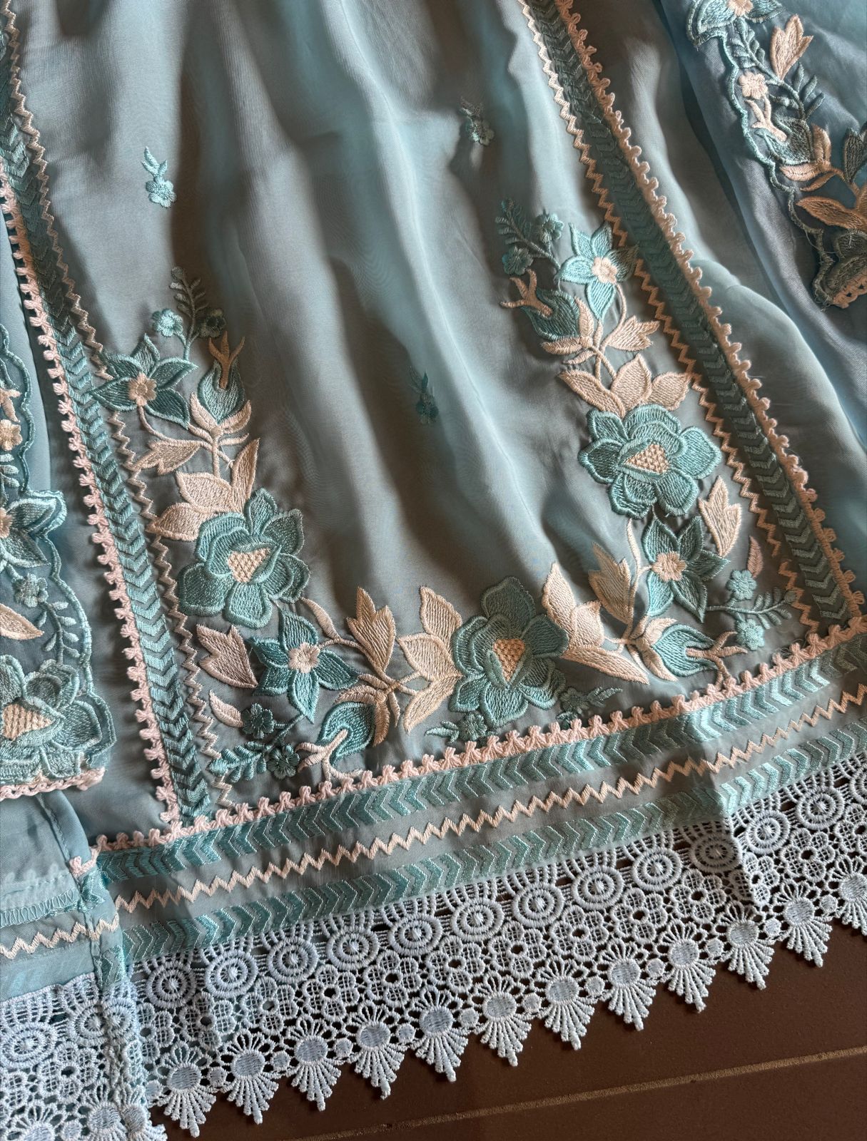 Soft organza shirt semi stitched with beautiful floral thread embroidery concept on the necklin