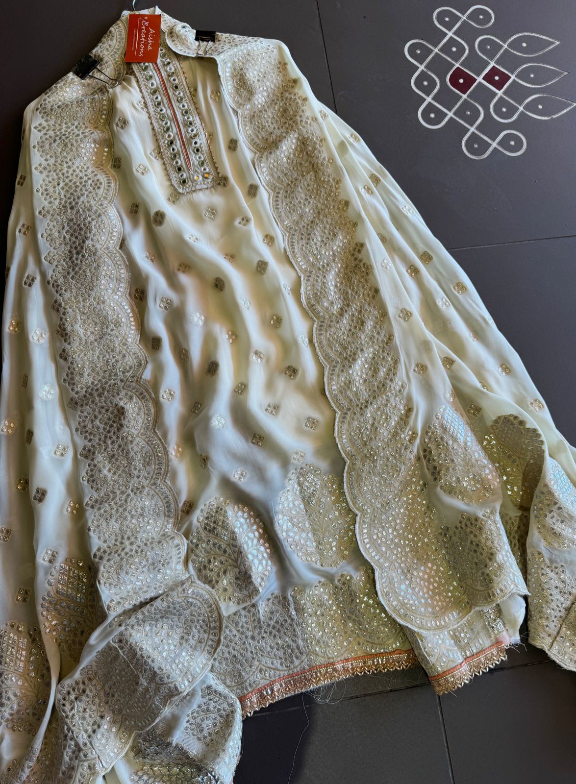 Pure banarsi Georgette shirt with overall zari booties with very beautiful neckline with mirror work done.