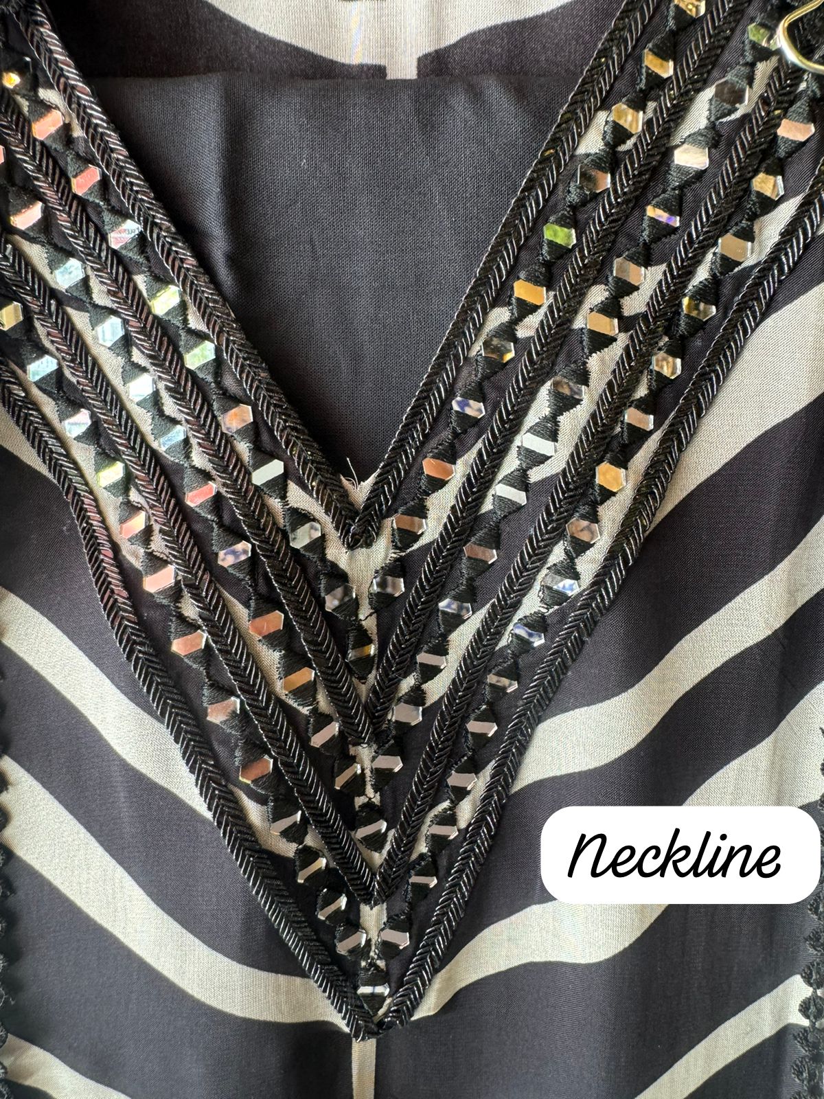 Soft and flowy digital printed shirt very smart printed shirt with mirror work done on the neckline