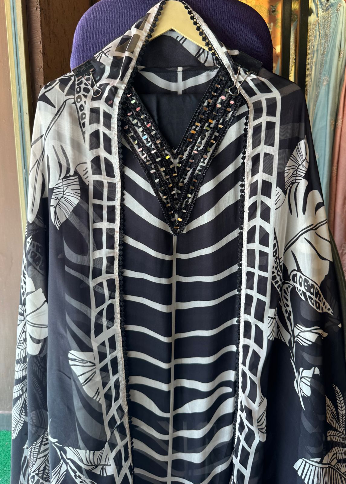 Soft and flowy digital printed shirt very smart printed shirt with mirror work done on the neckline
