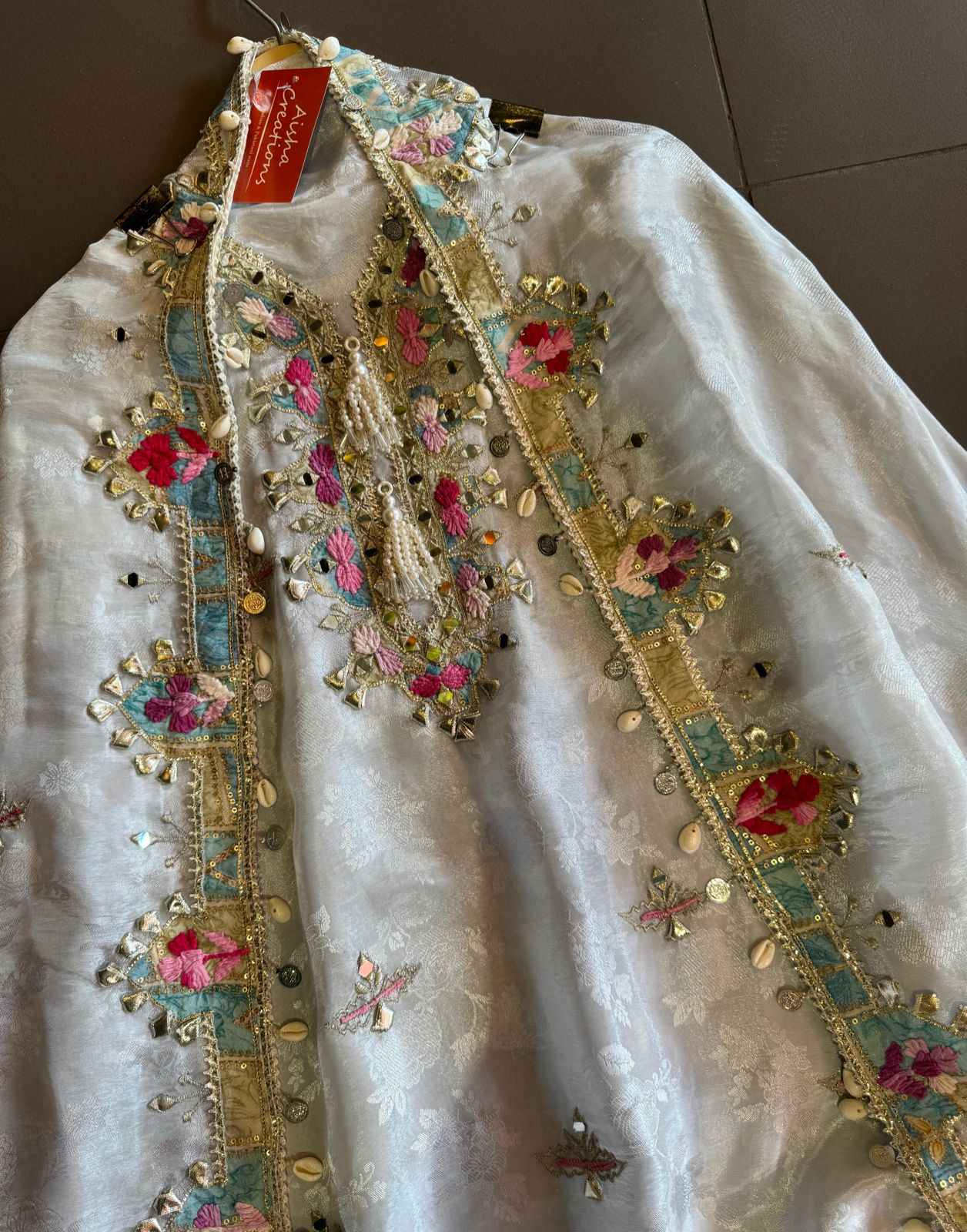 Self weaved silk shirt with very gorgeous thread embroidery and gotta work with mirror highlighting
