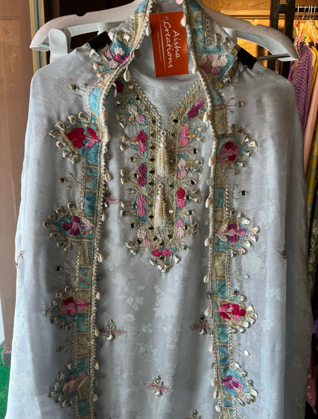 Self weaved silk shirt with very gorgeous thread embroidery and gotta work with mirror highlighting