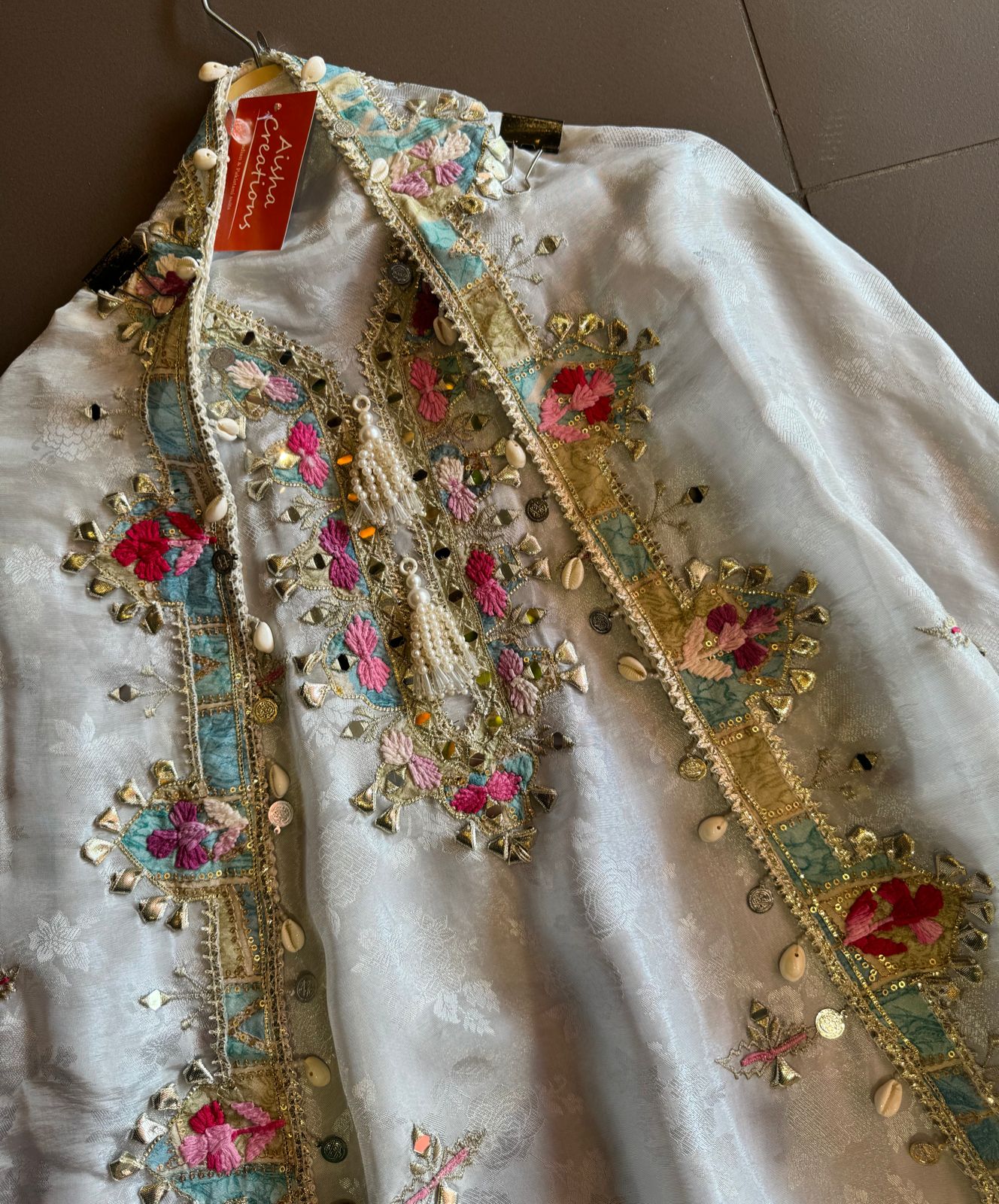 Self weaved silk shirt with very gorgeous thread embroidery and gotta work with mirror highlighting