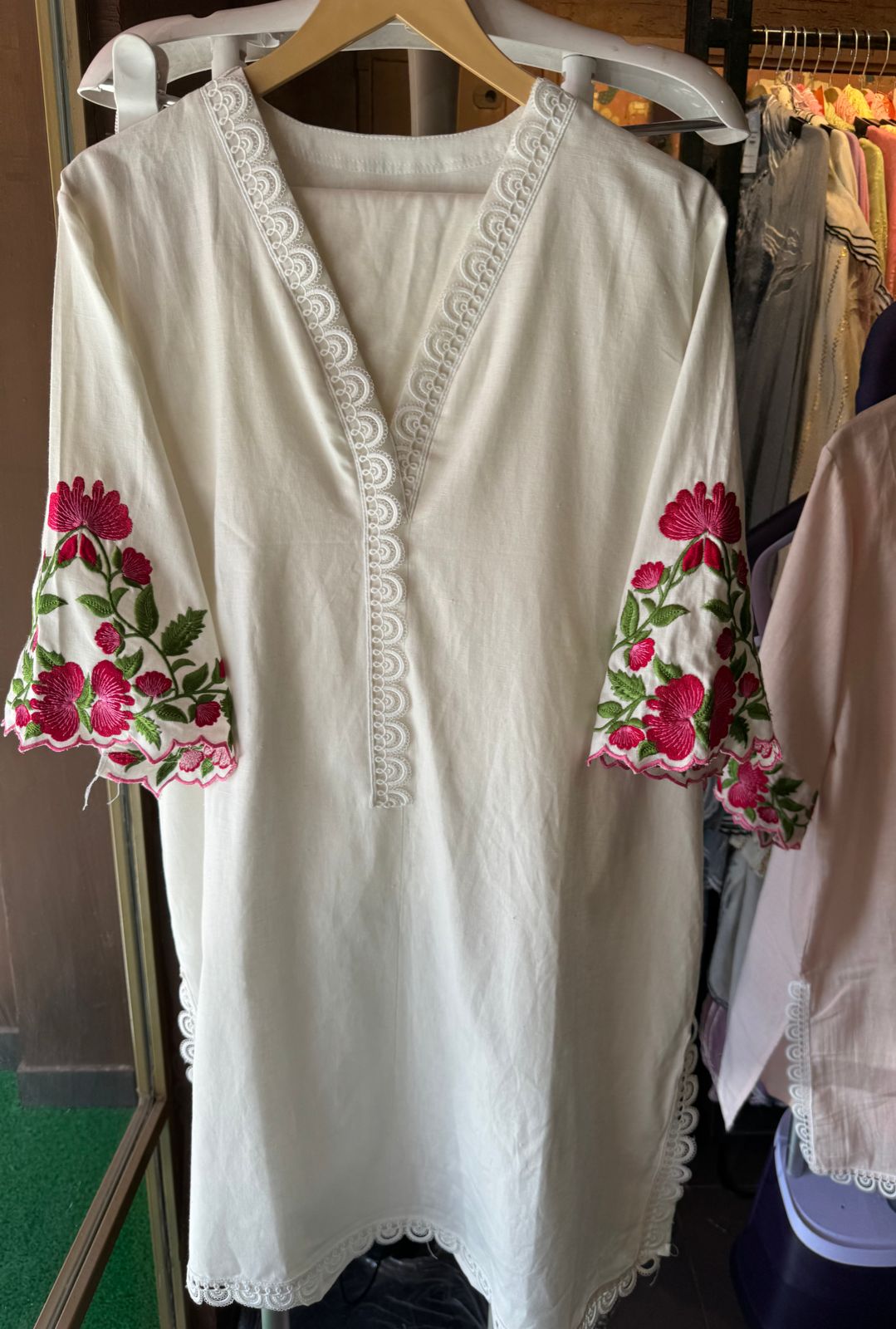 Pure cotton linen stitched tunic with lace attached on the neckline and ghera
