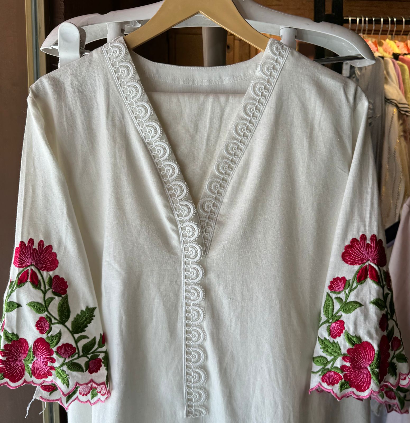 Pure cotton linen stitched tunic with lace attached on the neckline and ghera