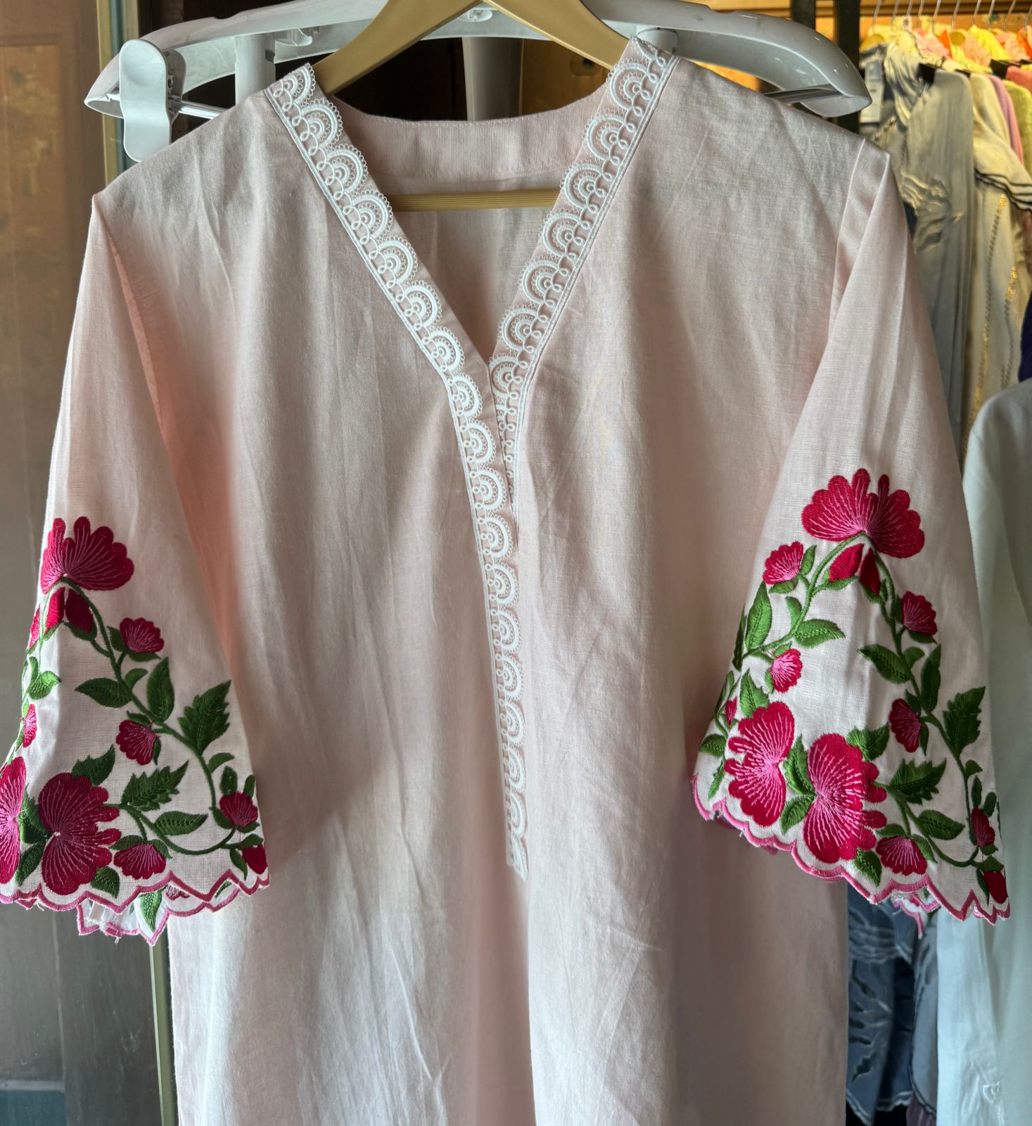 Pure cotton linen stitched tunic with lace attached on the neckline and ghera