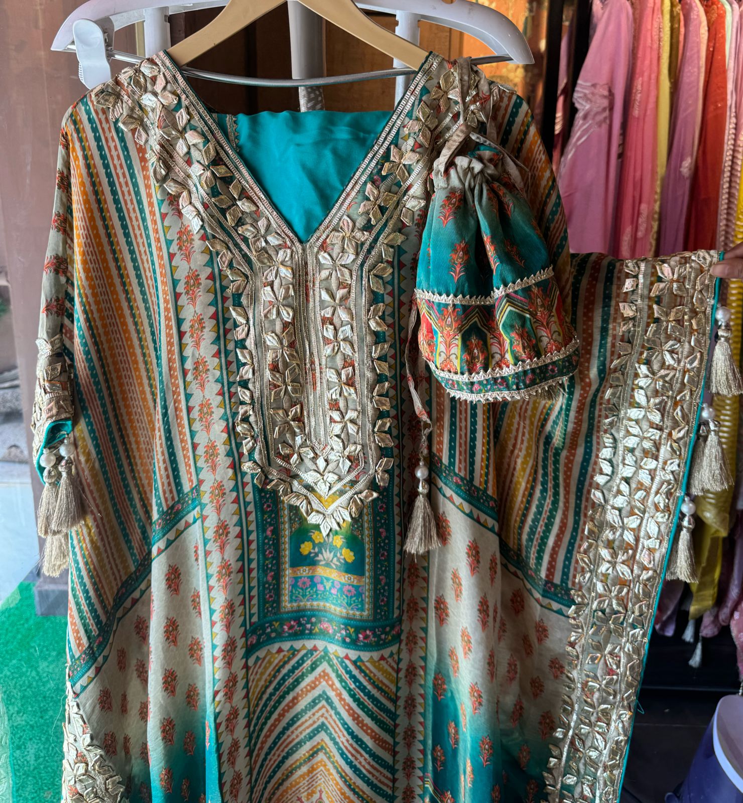 Pure shimmer tissue sabysachi inspired printed kaaftan with gotta work on the neckline