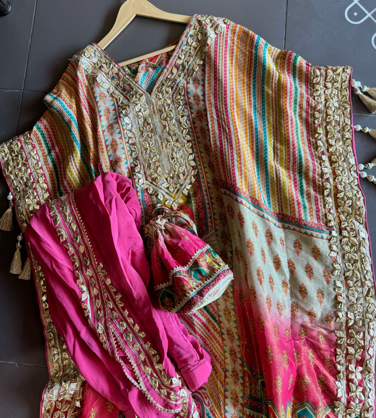 Pure shimmer tissue sabysachi inspired printed kaaftan with gotta work on the neckline