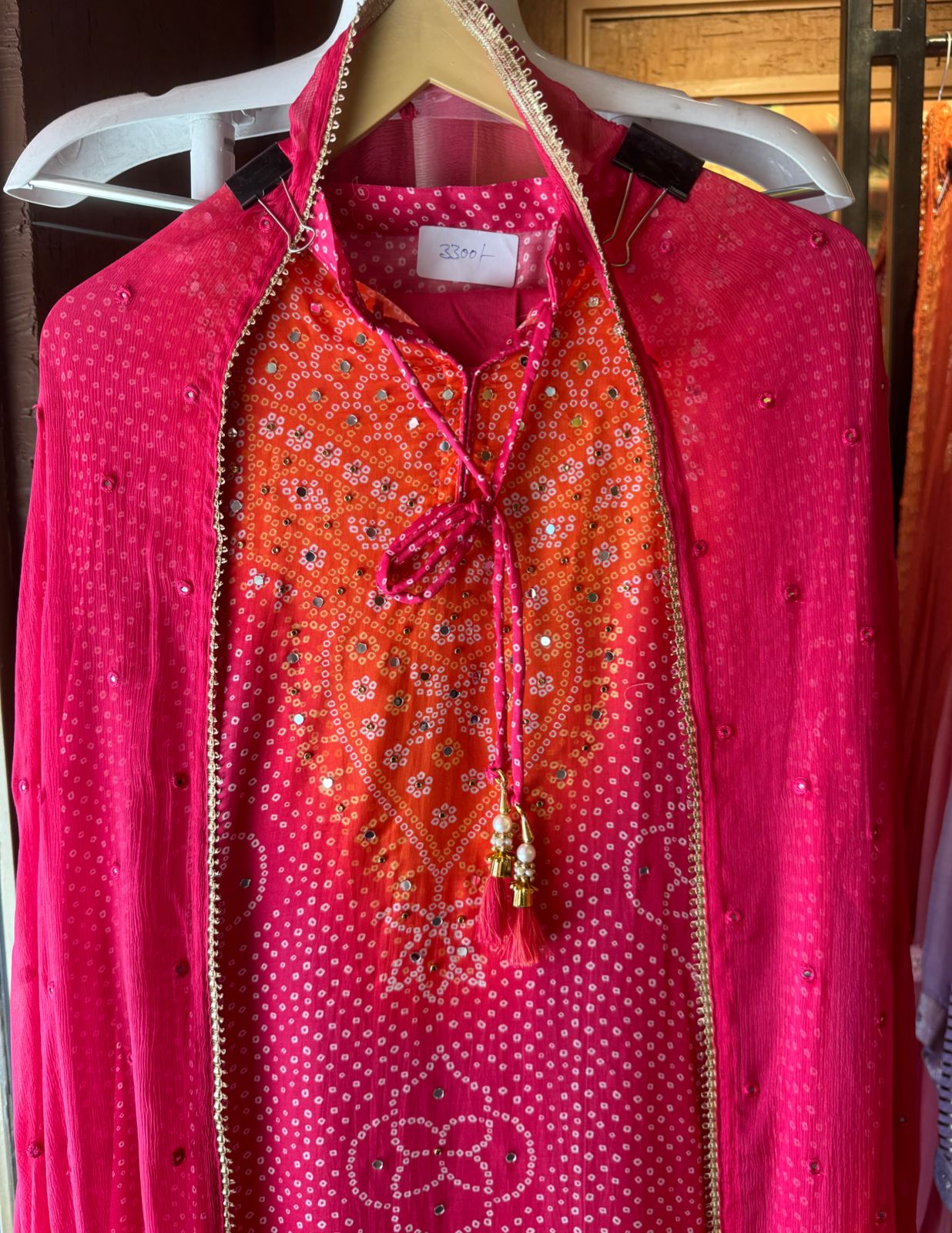 Beautiful semi stitched bandhani printed ombre shirt with dori on the front