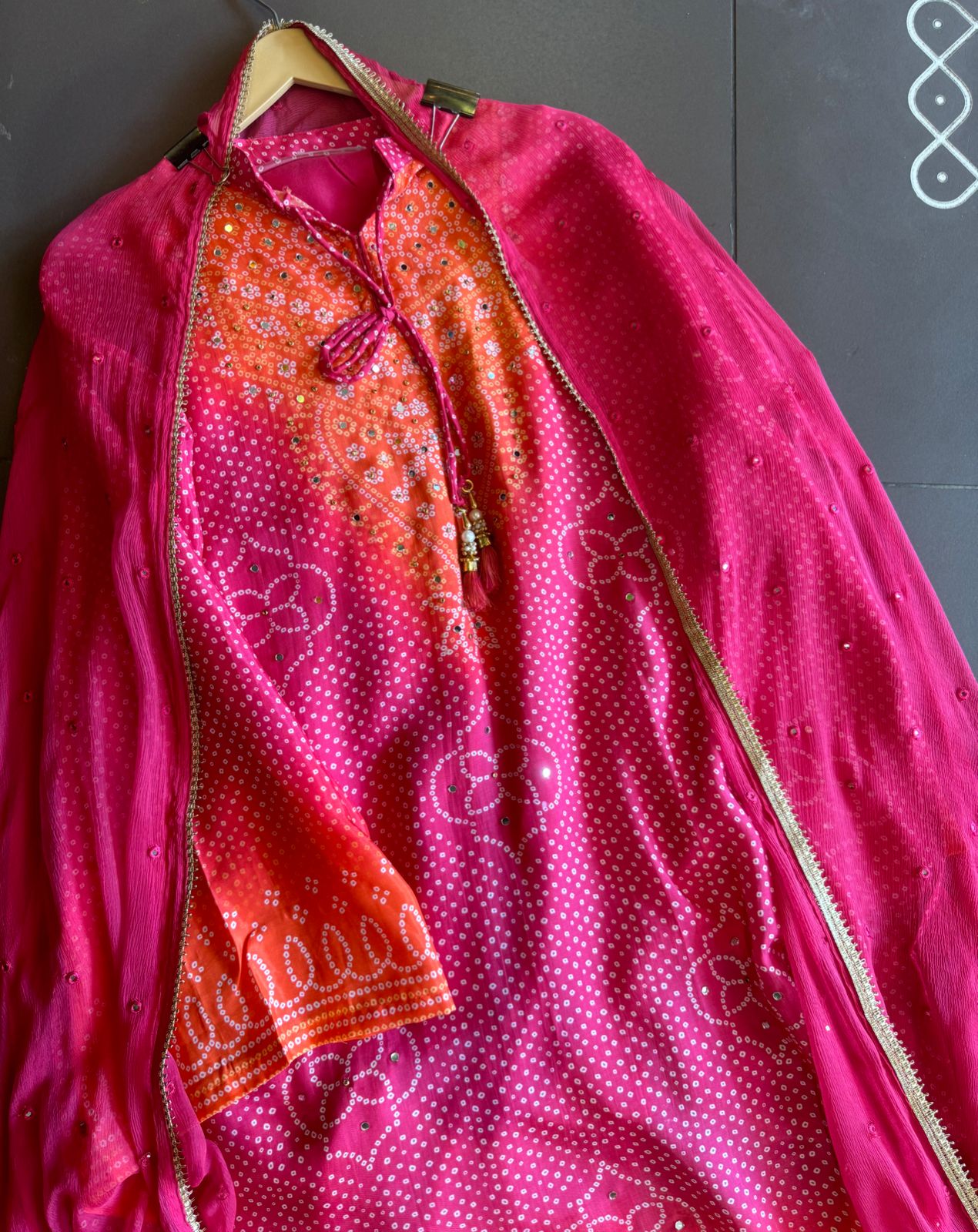 Beautiful semi stitched bandhani printed ombre shirt with dori on the front