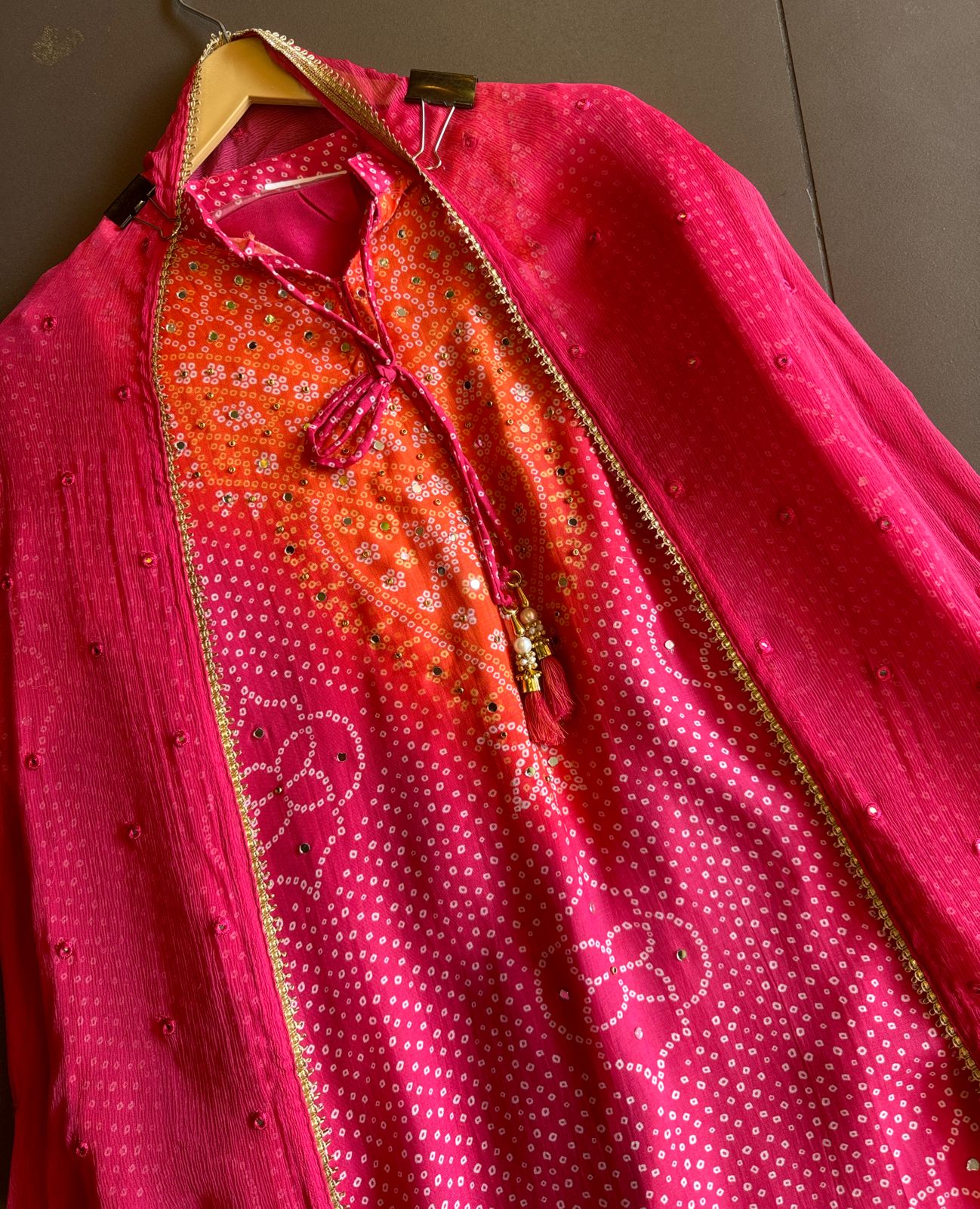 Beautiful semi stitched bandhani printed ombre shirt with dori on the front