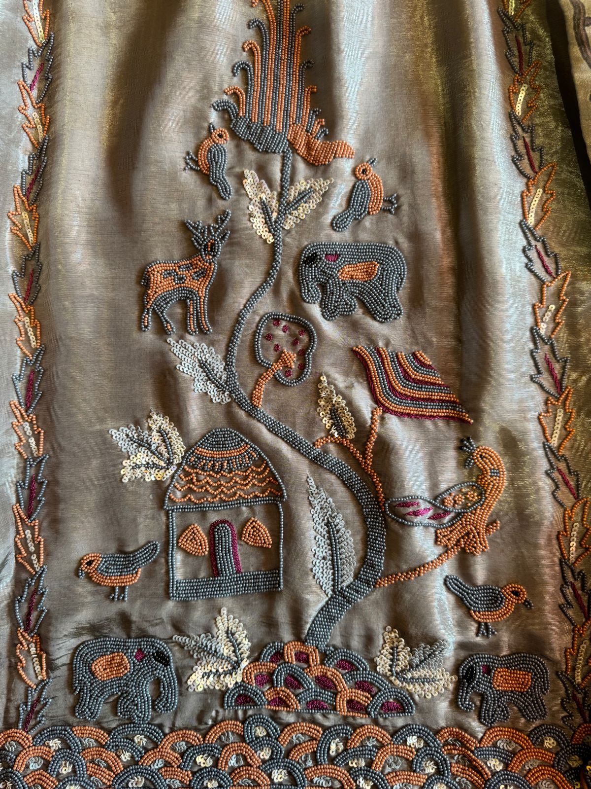 Soft tissue Unstitched Shirt With very Neat handwork done on the neck Patti and The shirt front.