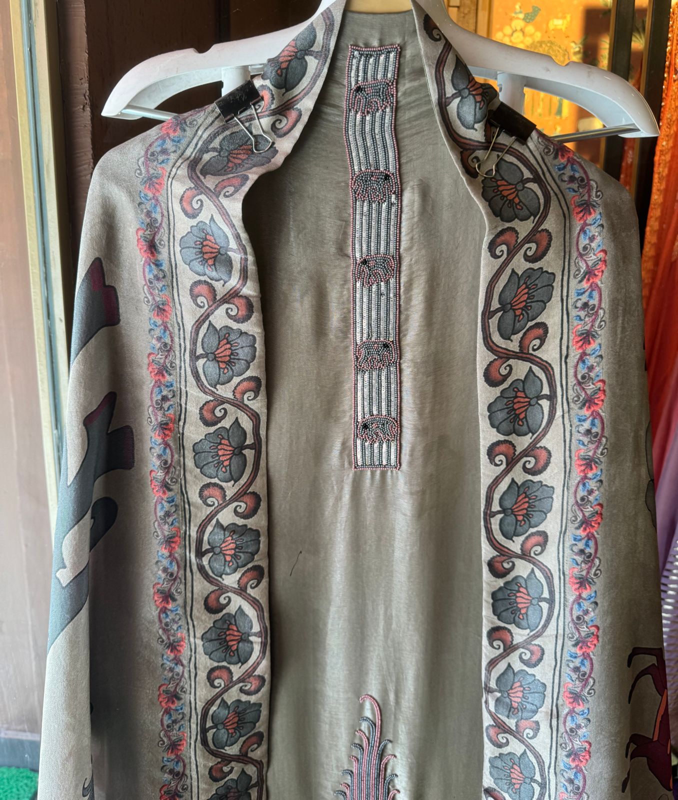 Soft tissue Unstitched Shirt With very Neat handwork done on the neck Patti and The shirt front.
