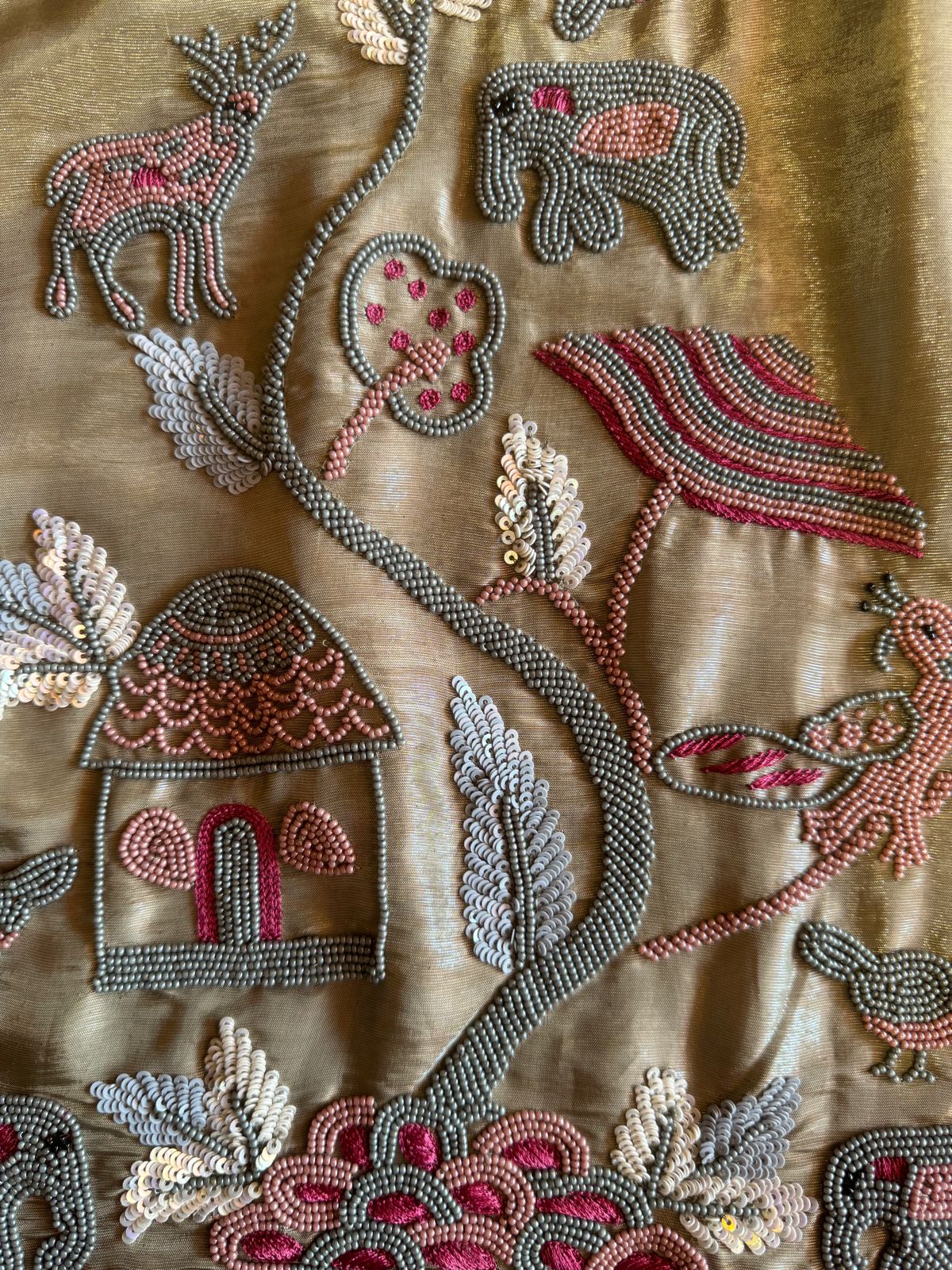 Soft tissue Unstitched Shirt With very Neat handwork done on the neck Patti and The shirt front.