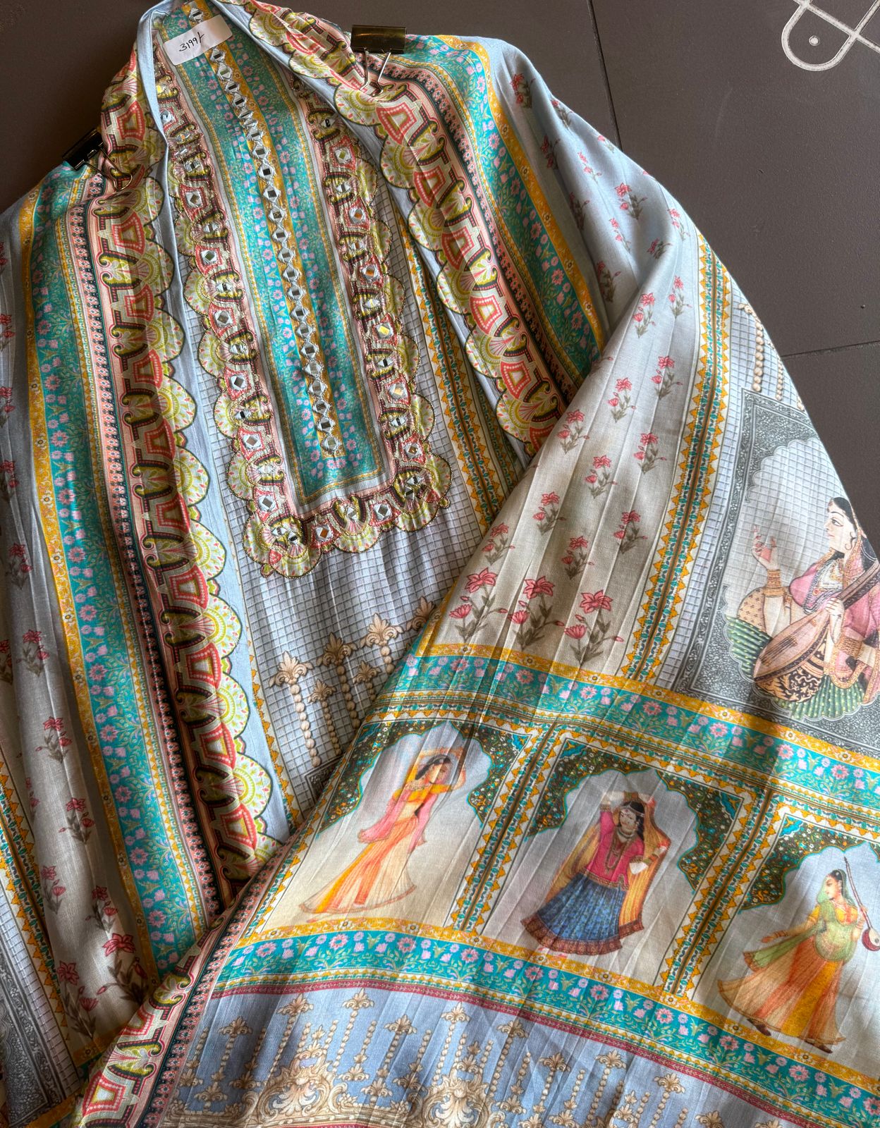 Soft digital printed muslin shirt with hardworking highlights on the neckline with very beautiful concept