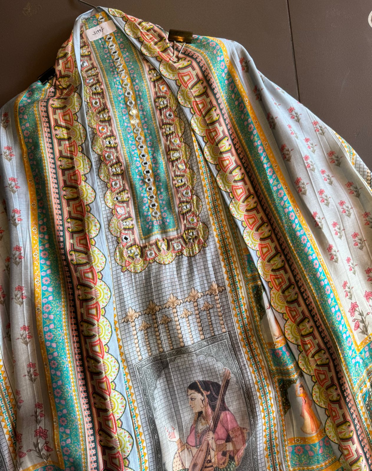 Soft digital printed muslin shirt with hardworking highlights on the neckline with very beautiful concept