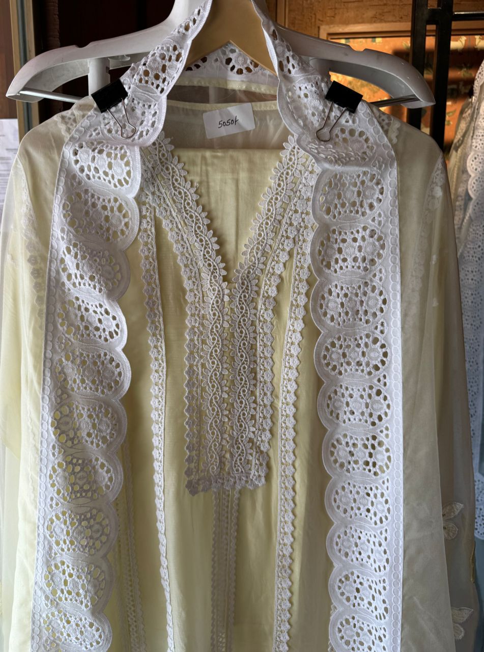 Soft organza unstitched suits with heavy crochia lace work detailings on the shirt